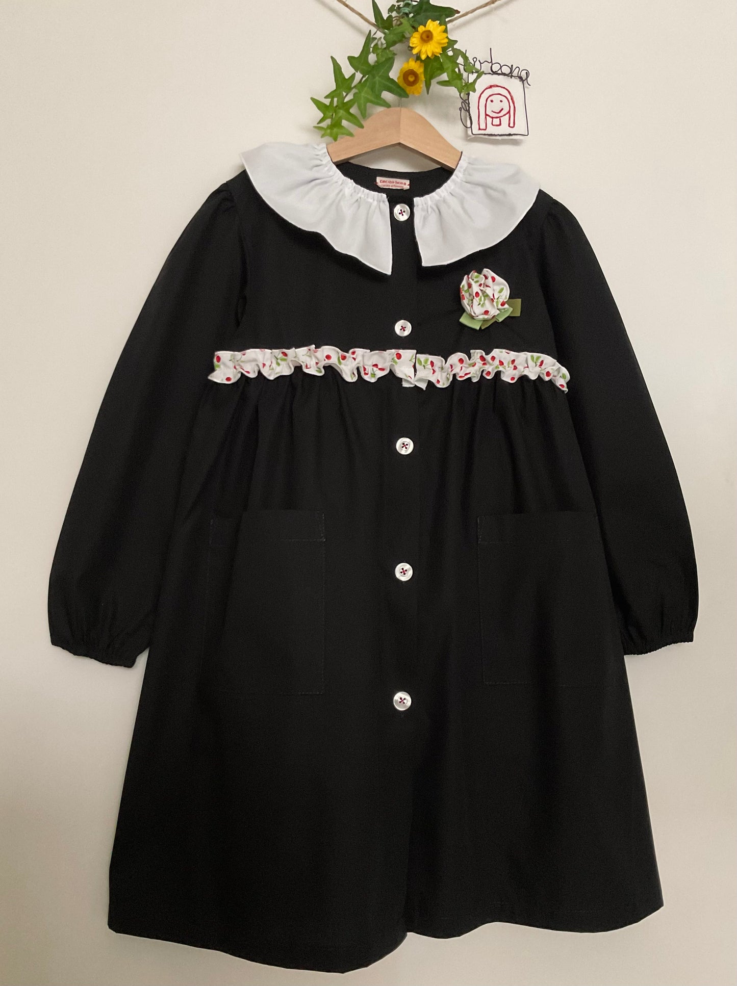 The black apron with cherries and pierrot collar for primary school